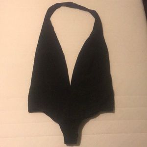 Black plunging body suit